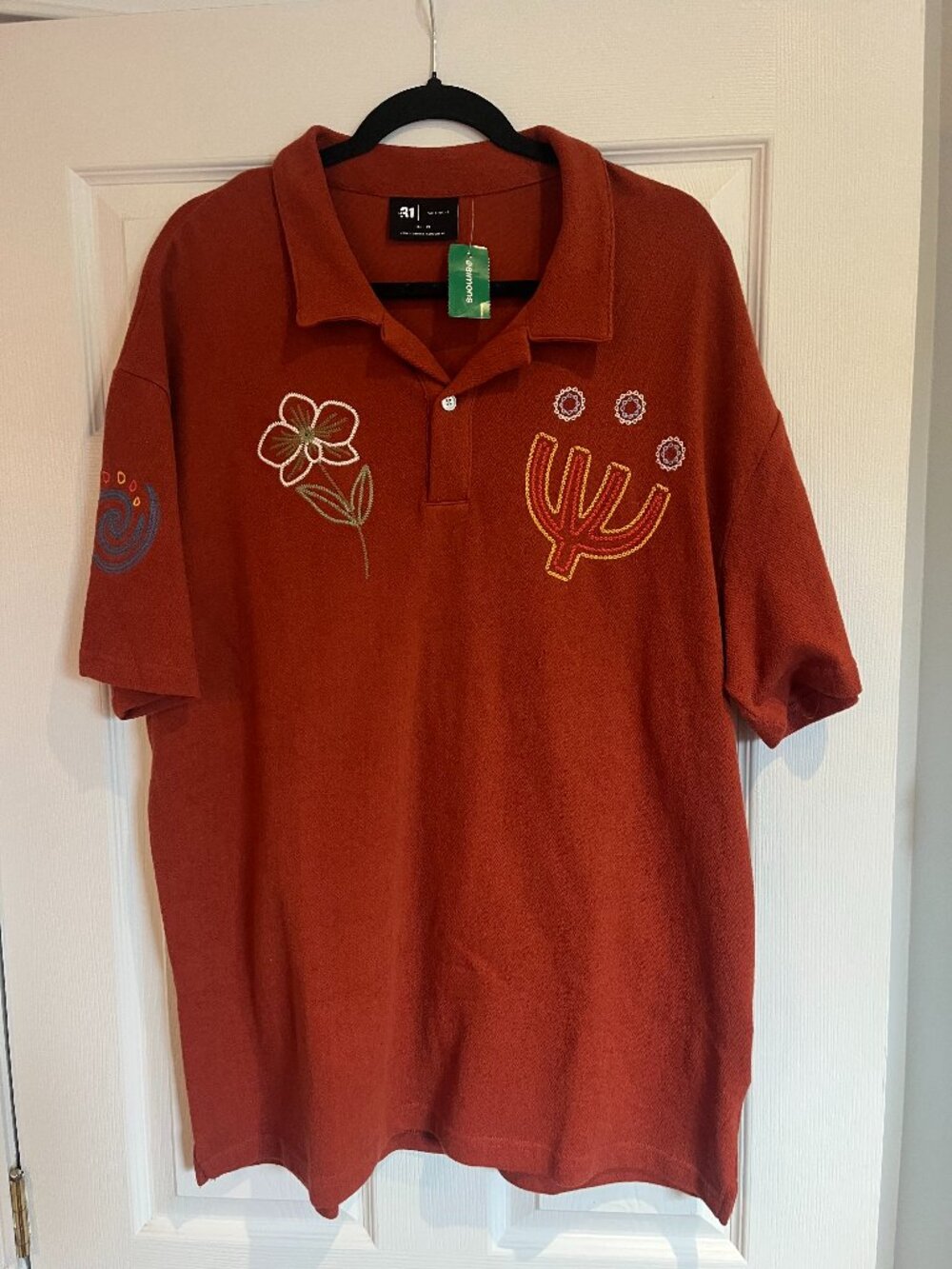Men's Polo Shirt.  Size: XL.  100% cotton with embroidery.  Retail:$69+tax